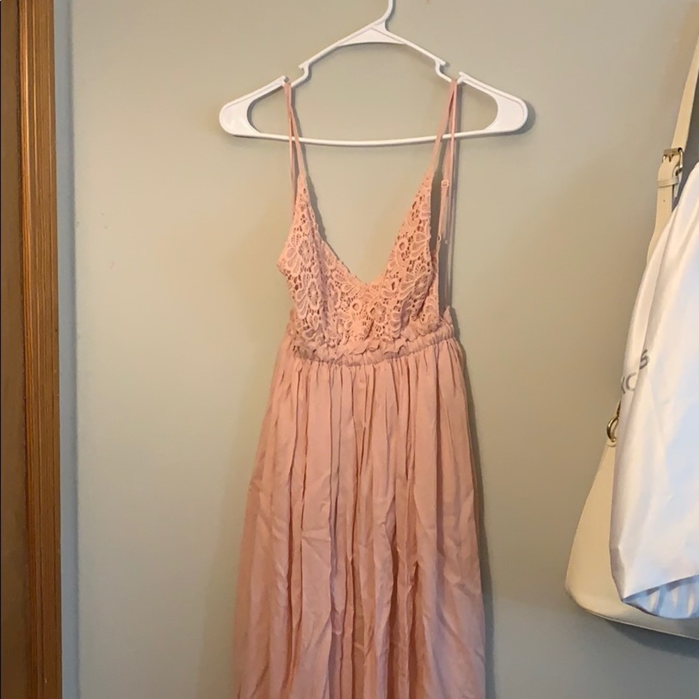 Long backless dress from Lime Lish boutique.